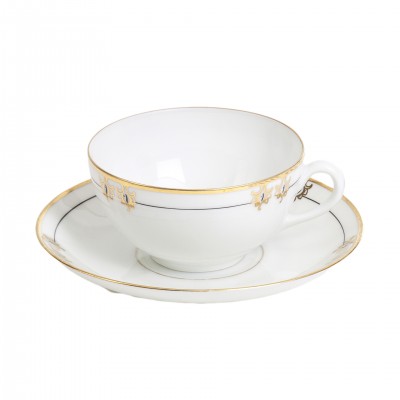 Porcelanowa filiżanka do herbaty. Subtelny złoty dekor. Sygn. ALP Liaköping